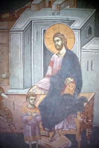 Detail of fresco depicting Christ holding St.Ignatius as a child.
