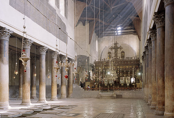 Interior of the Church of the Nativity, looking east towards the altar and the entrance to the Grotto.